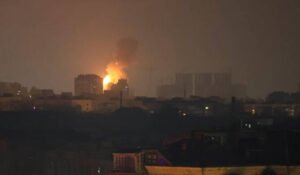 Russian attack sparks fire at Ukraine government building in Kyiv