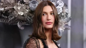 Hailey Bieber Stuns in Fur Coat and Bikini Top for Vogue