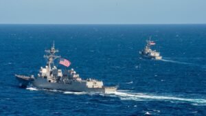 US warship flees Iranian waters US warship flees Iranian waters